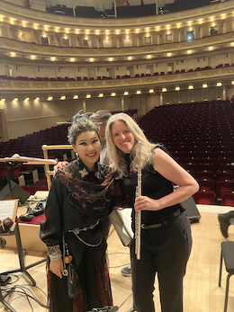 with Wukong Black Myth Chinese Flutist in traditional dress at Carnegie Hall